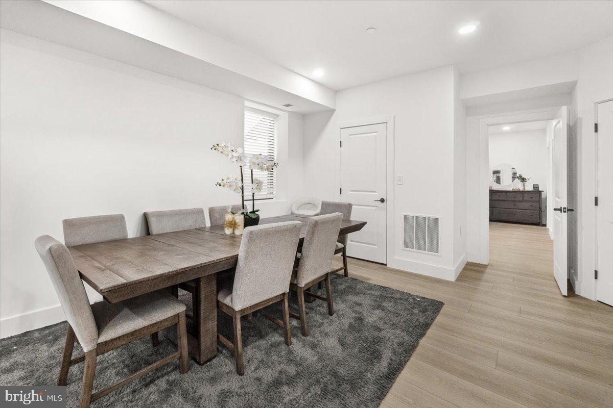 15807 Thompson Road Silver Spring, MD 20905 - Photo 65 of 82 a view of a dining room with furniture