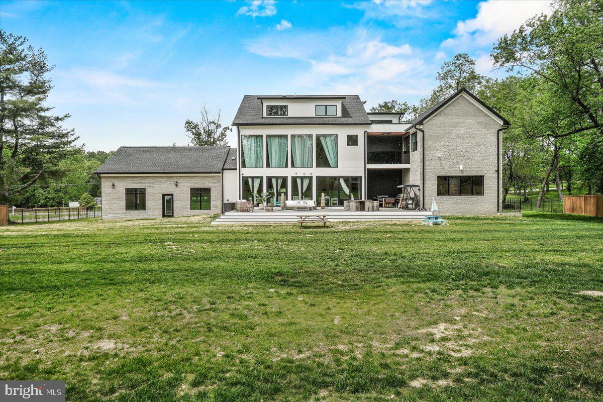 15807 Thompson Road Silver Spring, MD 20905 - Photo 76 of 82 a front view of a house with a yard