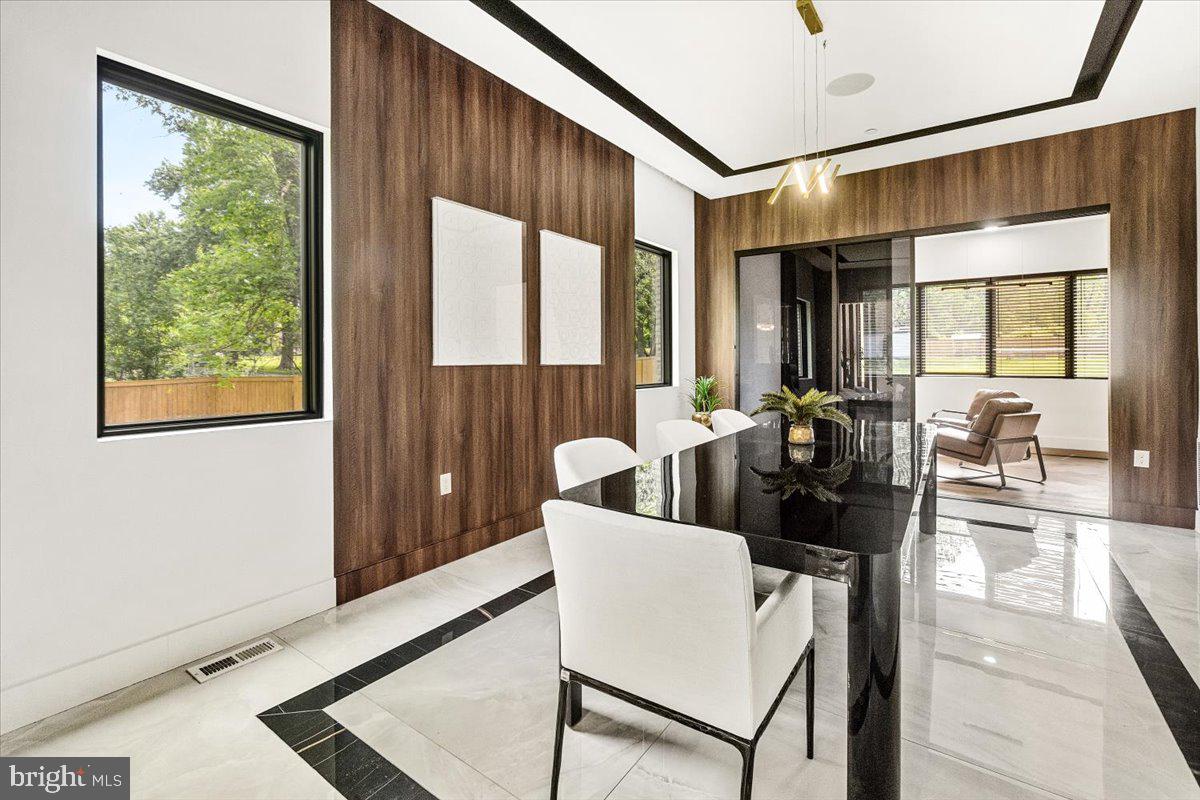 15807 Thompson Road Silver Spring, MD 20905 - Photo 8 of 82 a living room with furniture and a large window