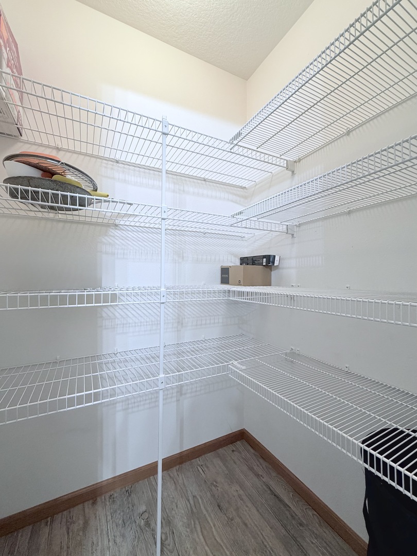 213 East Price Street, Unit 202 Eldridge, IA 52748 - Photo 17 of 20 a view of a closet area with an empty space