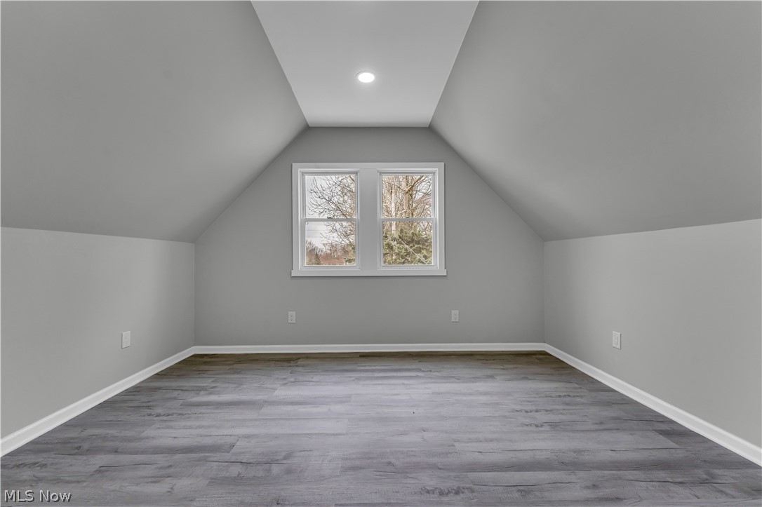 1000 Pennfield Road Cleveland, OH 44121 - Photo 26 of 34 Bonus room featuring lofted ceiling and light hardwood / wood-style flooring