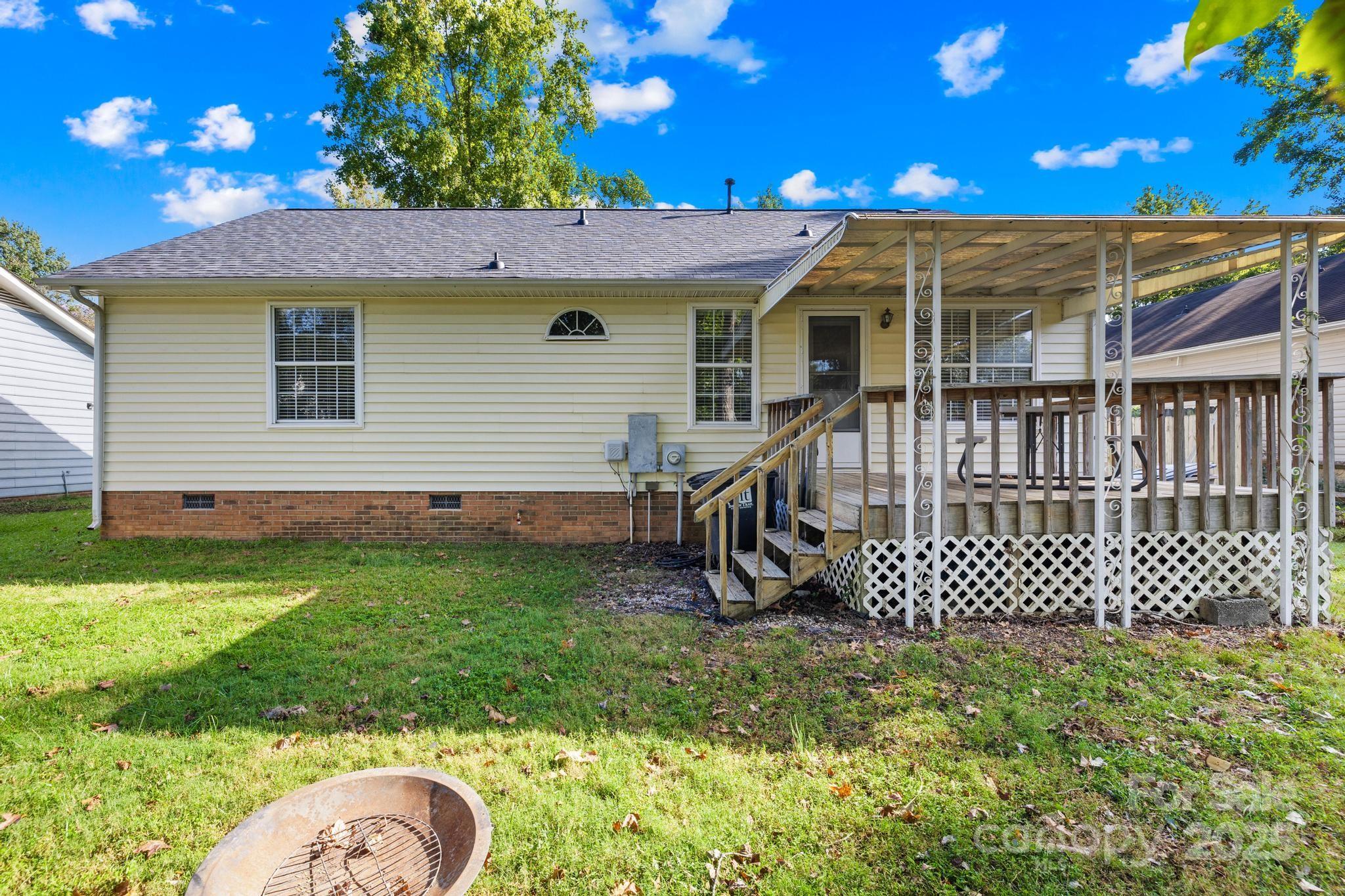 4805 Shea Court Monroe, NC 28110 - Photo 24 of 35 a view of a house with a backyard