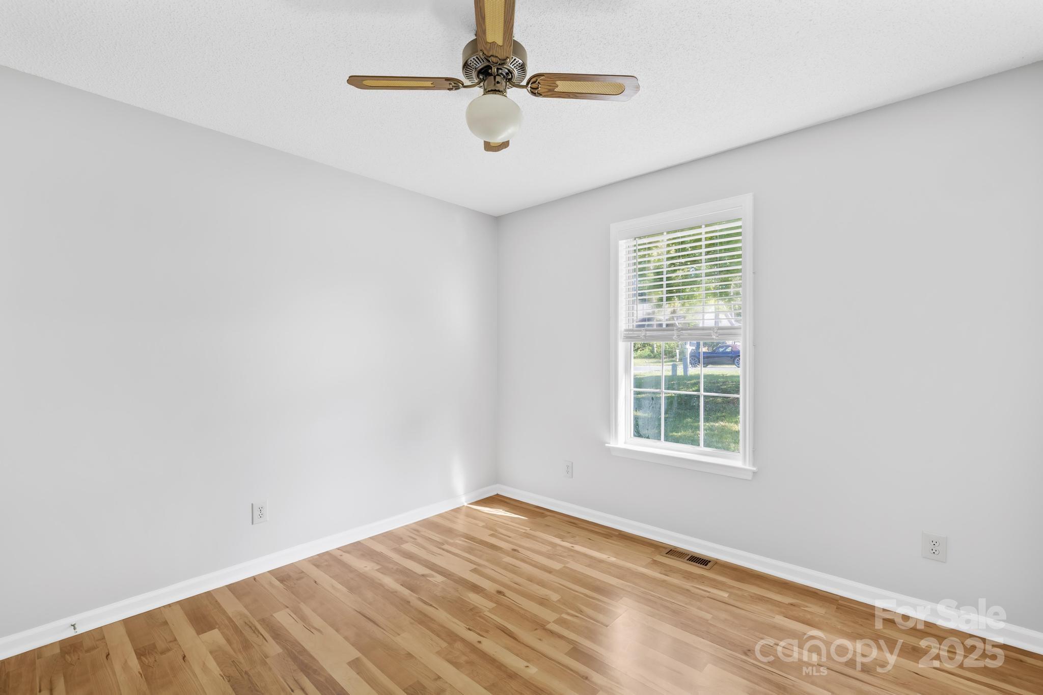 4805 Shea Court Monroe, NC 28110 - Photo 6 of 35 an empty room with windows
