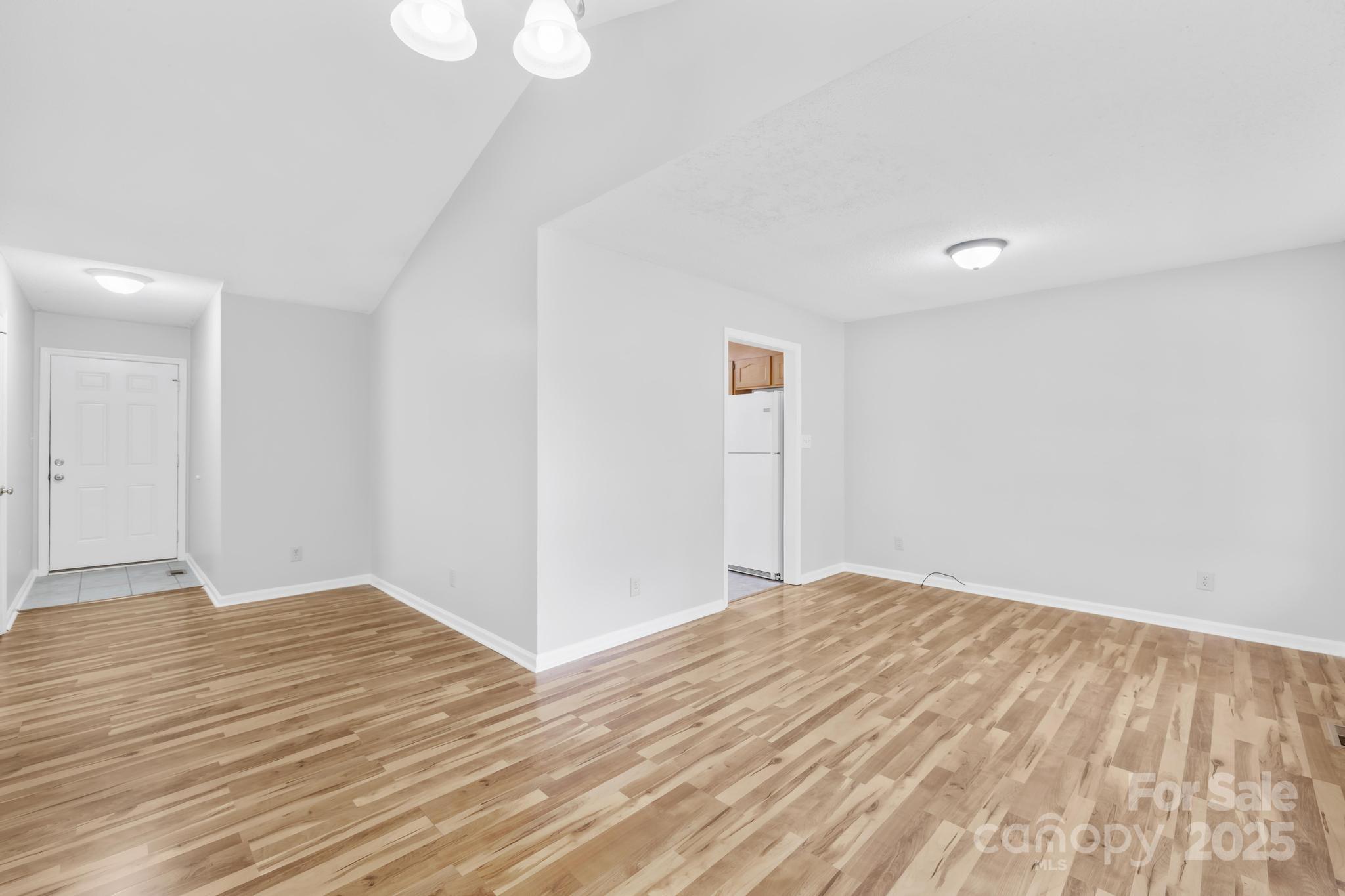 4805 Shea Court Monroe, NC 28110 - Photo 9 of 35 a view of empty room with wooden floor