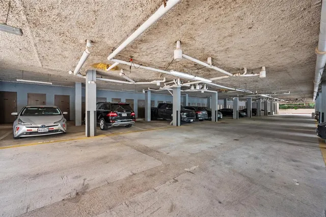 a car parked in parking lot of building