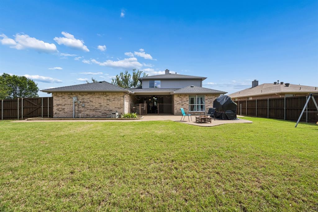 545 Rothschild Lane Murphy, TX 75094 - Photo 26 of 27 Another view of large backyard and extended patio.