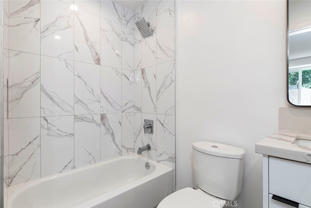 1843 West 20th Street Los Angeles, CA 90007 - Photo 12 of 38 a bathroom with a toilet and a sink