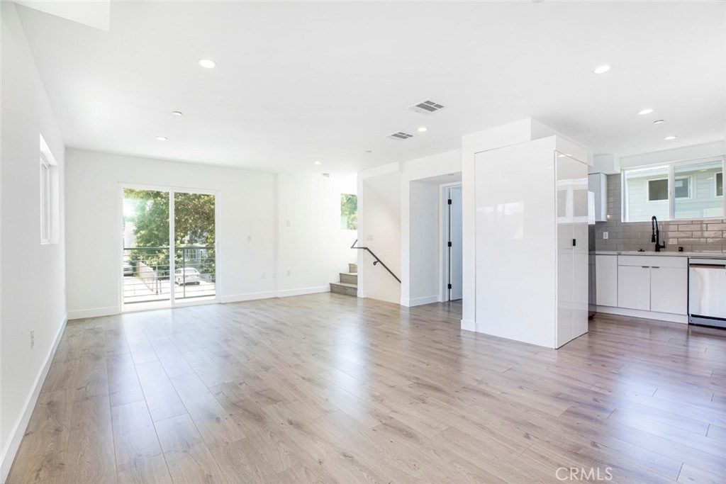 1843 West 20th Street Los Angeles, CA 90007 - Photo 17 of 38 a view of a kitchen with wooden floor and a window