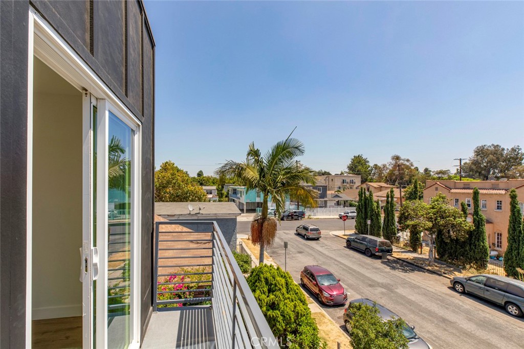 1843 West 20th Street Los Angeles, CA 90007 - Photo 34 of 38 a view of a balcony with chairs