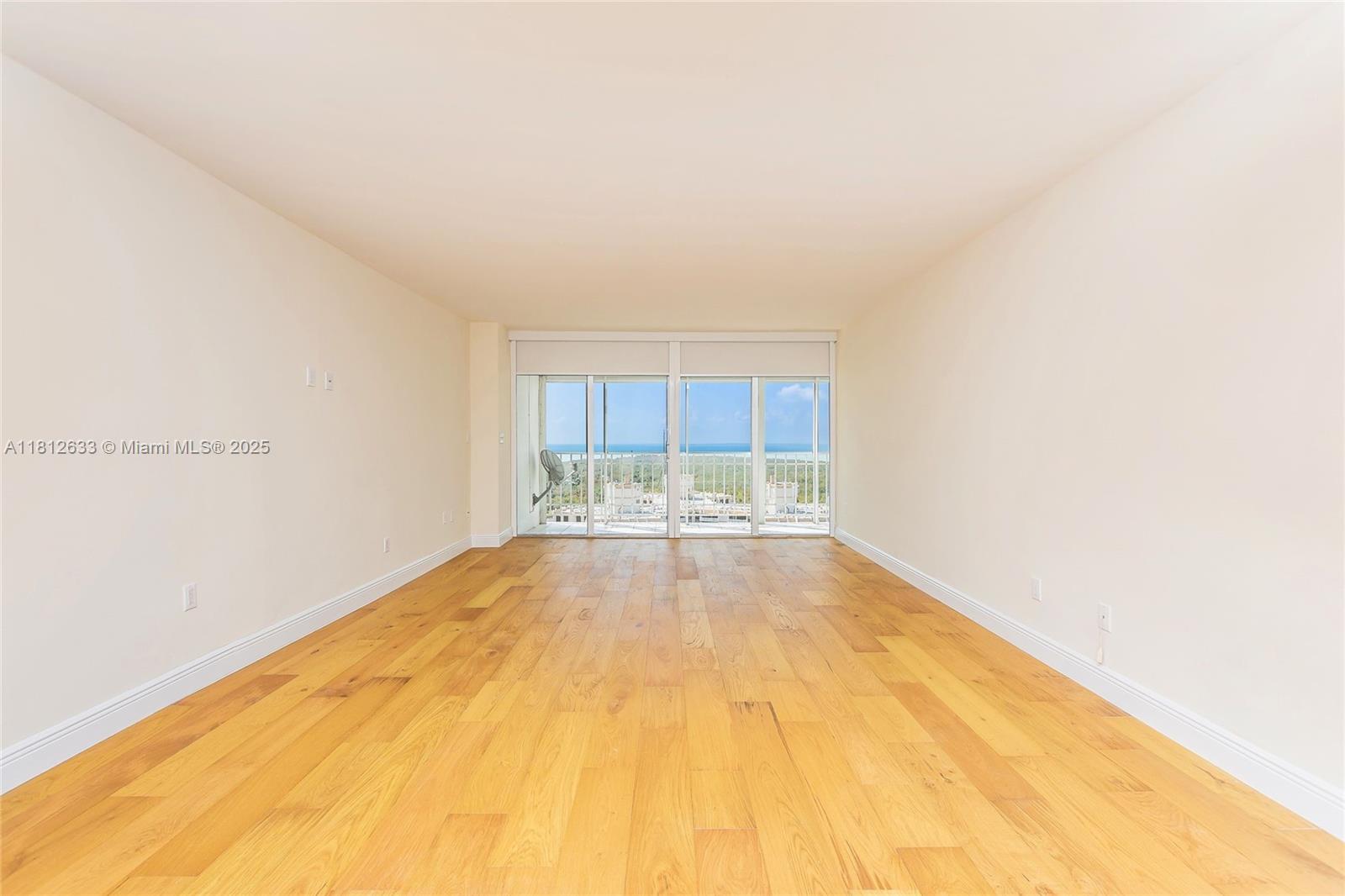 881 Ocean Drive, Unit 22A Key Biscayne, FL 33149 - Photo 20 of 26 a view of a room with a large window