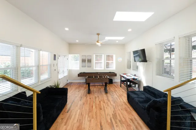 a bedroom with a bed and a chair