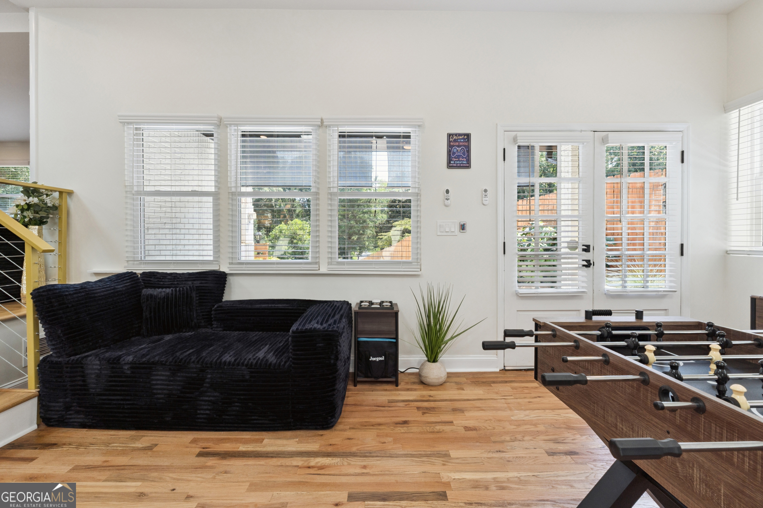 2139 Cedarbrook Court Southeast Atlanta, GA 30316 - Photo 27 of 69 a living room with furniture large window and wooden floor