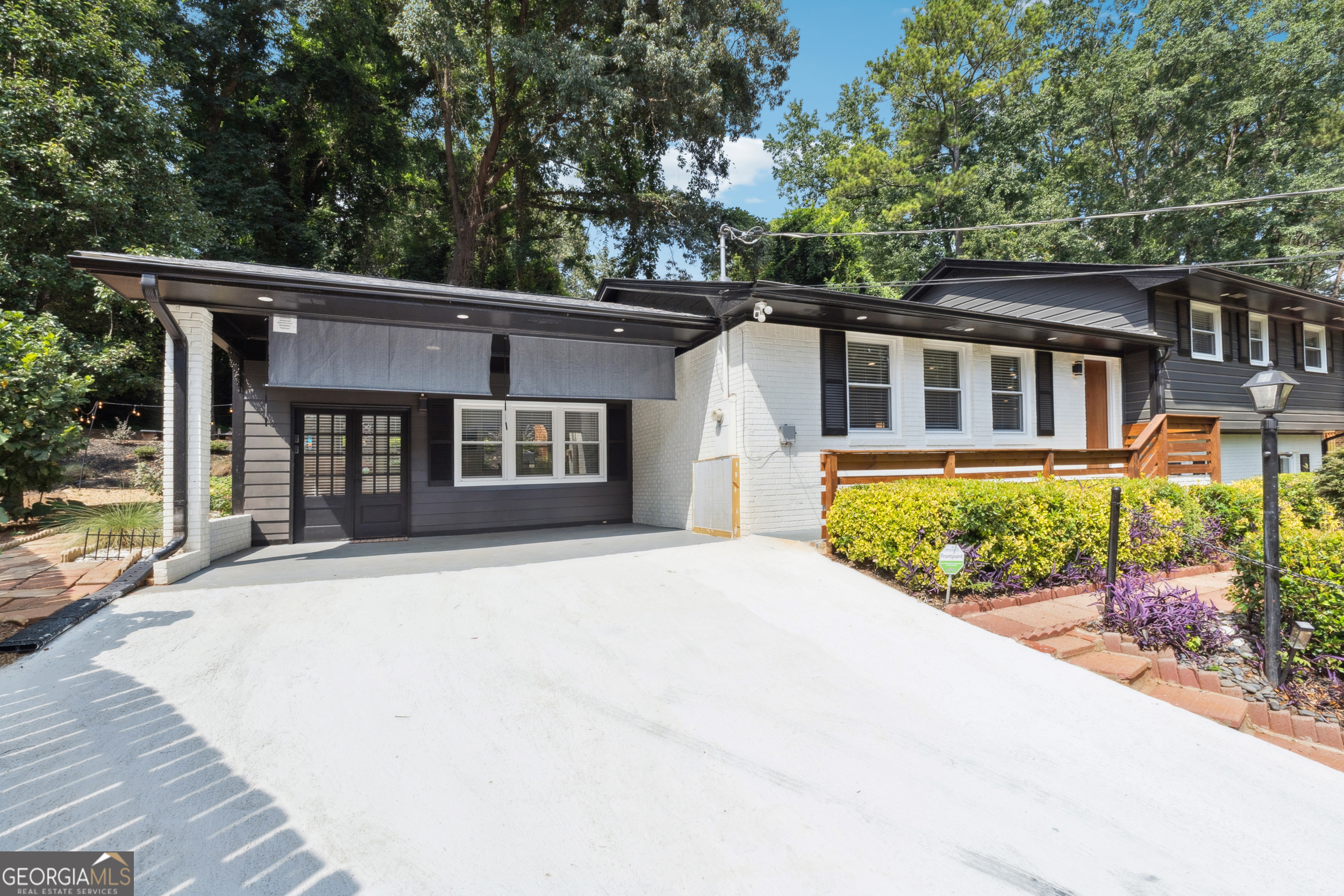 2139 Cedarbrook Court Southeast Atlanta, GA 30316 - Photo 3 of 69 a front view of a house with a yard and potted plants