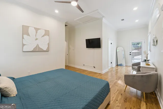 a view of kitchen with furniture and wooden floor