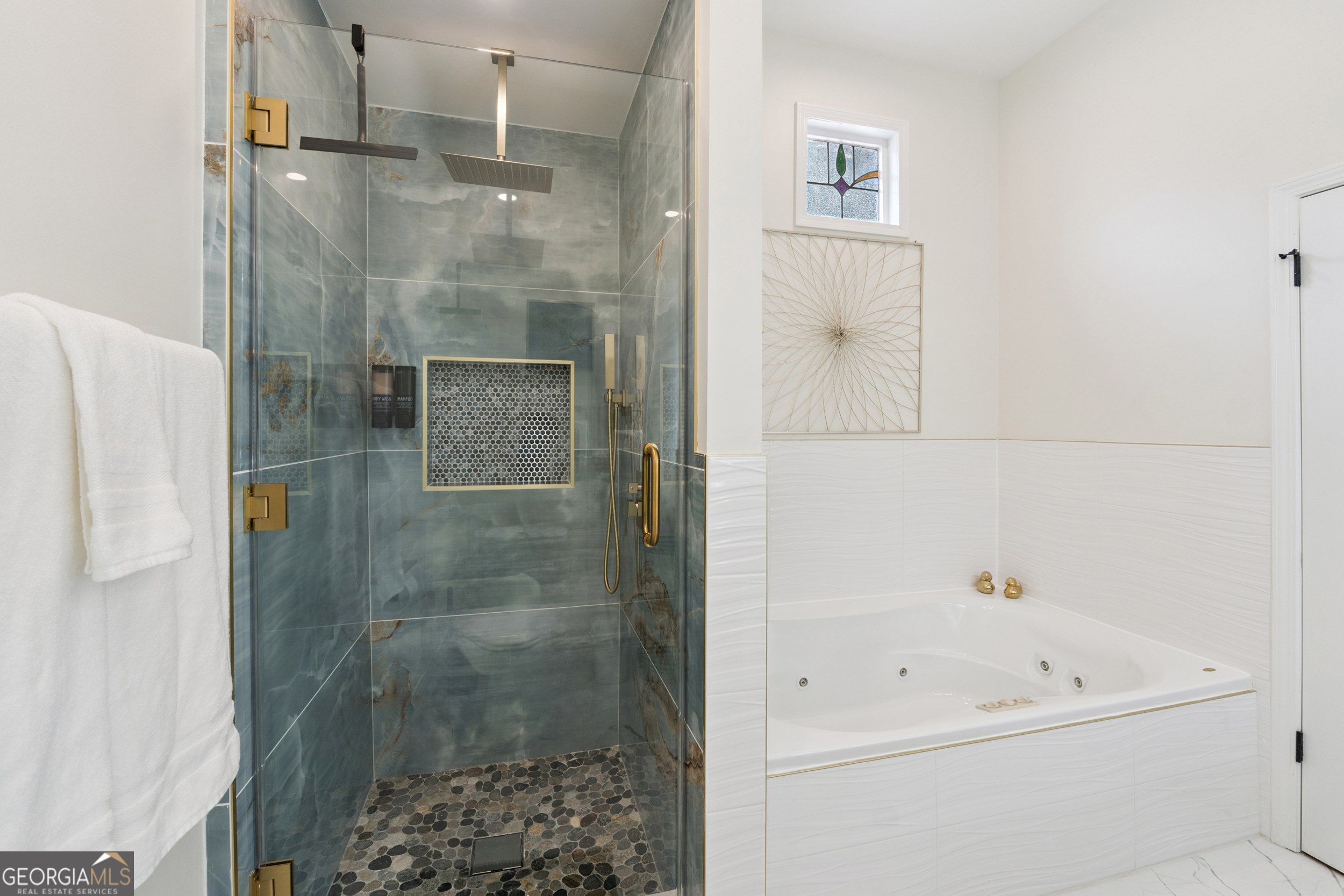 2139 Cedarbrook Court Southeast Atlanta, GA 30316 - Photo 36 of 69 a bathroom with a bathtub and a shower