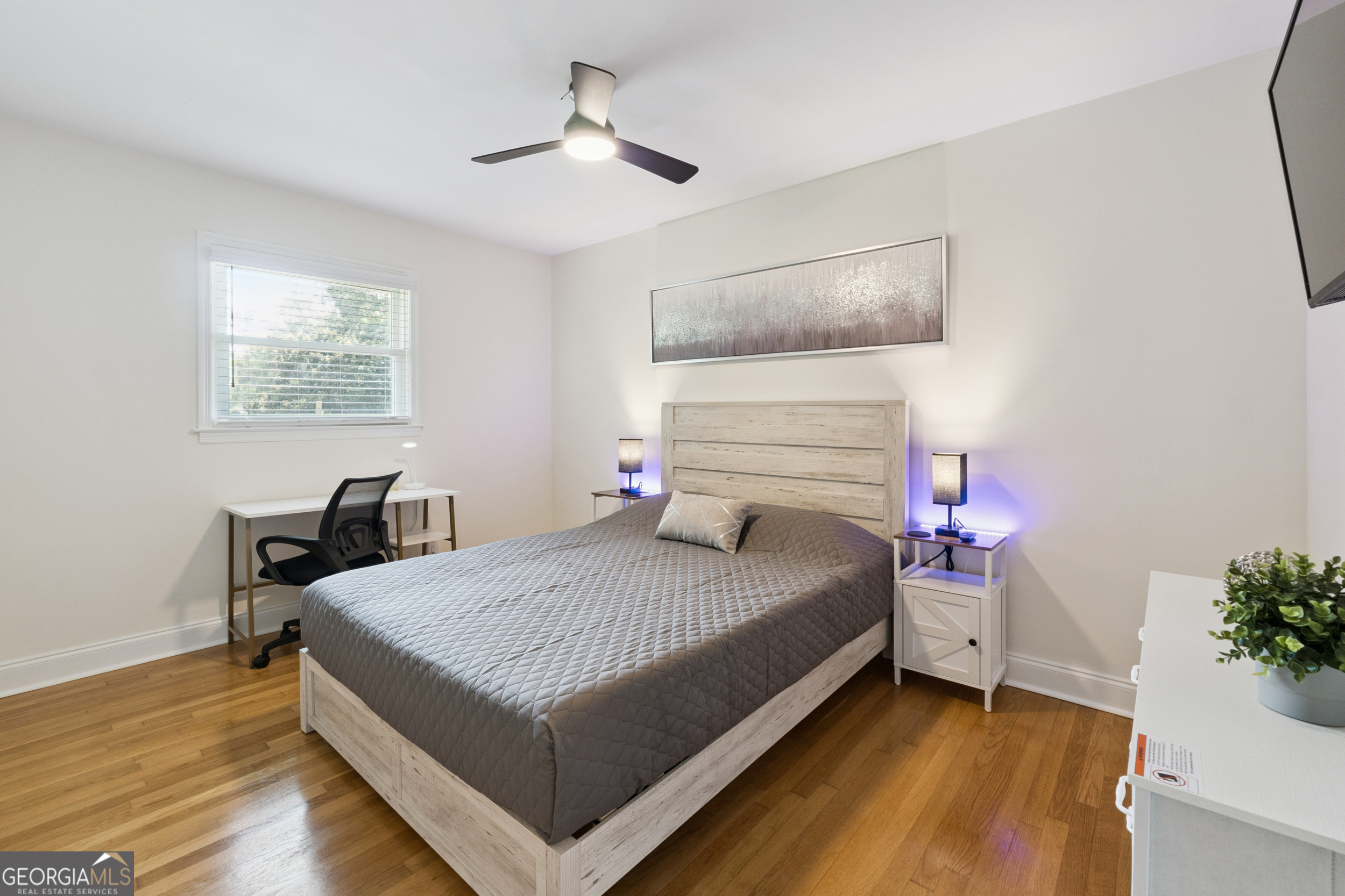 2139 Cedarbrook Court Southeast Atlanta, GA 30316 - Photo 38 of 69 a bedroom with a bed a chandelier and a window