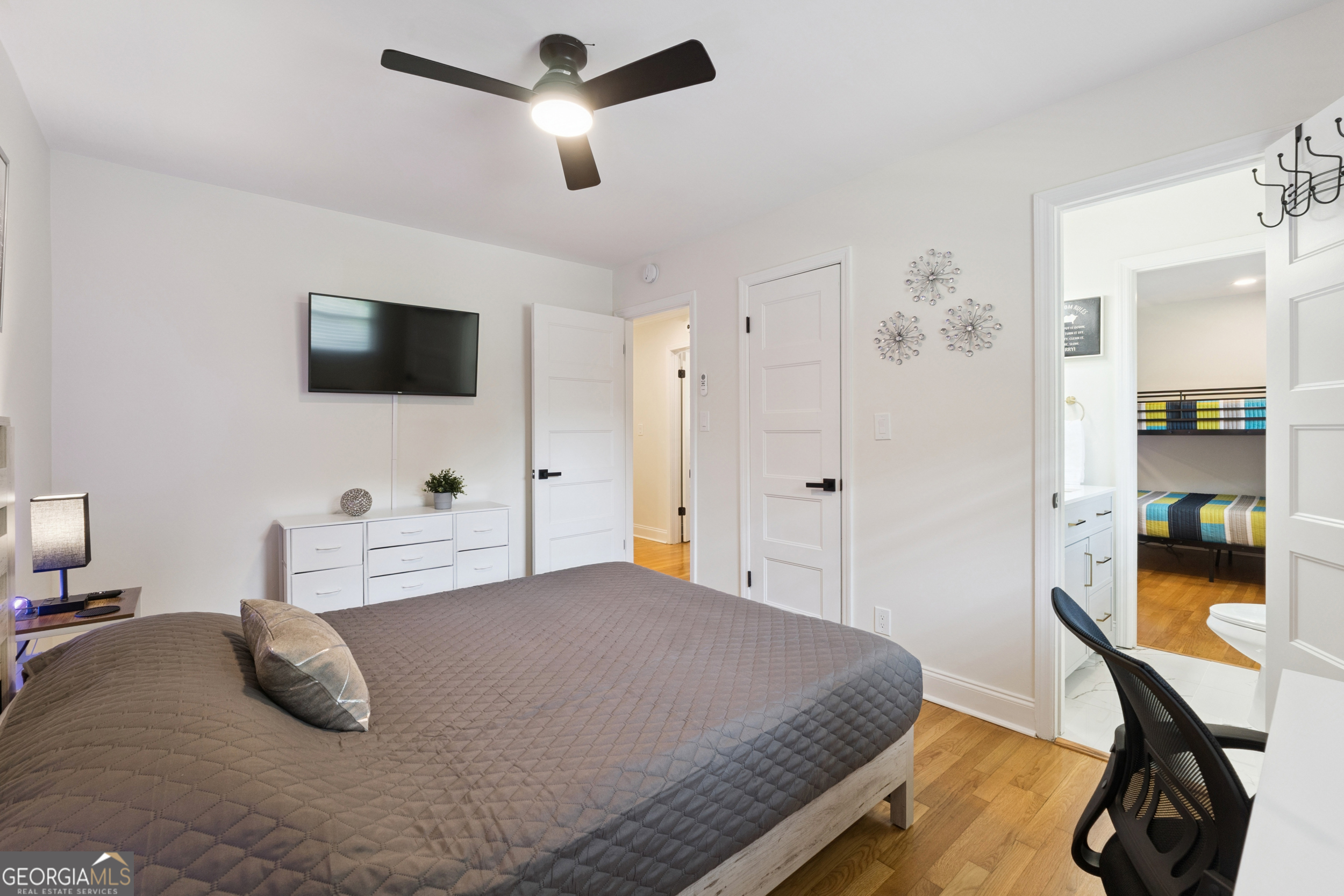 2139 Cedarbrook Court Southeast Atlanta, GA 30316 - Photo 39 of 69 a bedroom with a bed and a flat screen tv