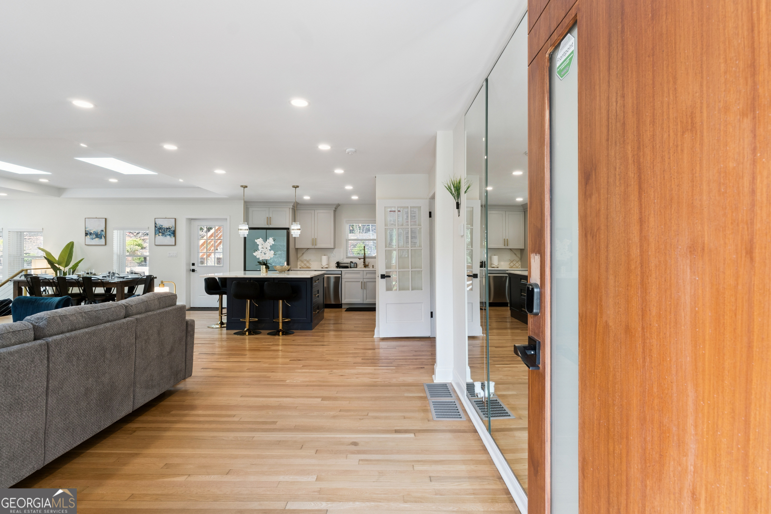 2139 Cedarbrook Court Southeast Atlanta, GA 30316 - Photo 5 of 69 a living room with furniture a table and kitchen view
