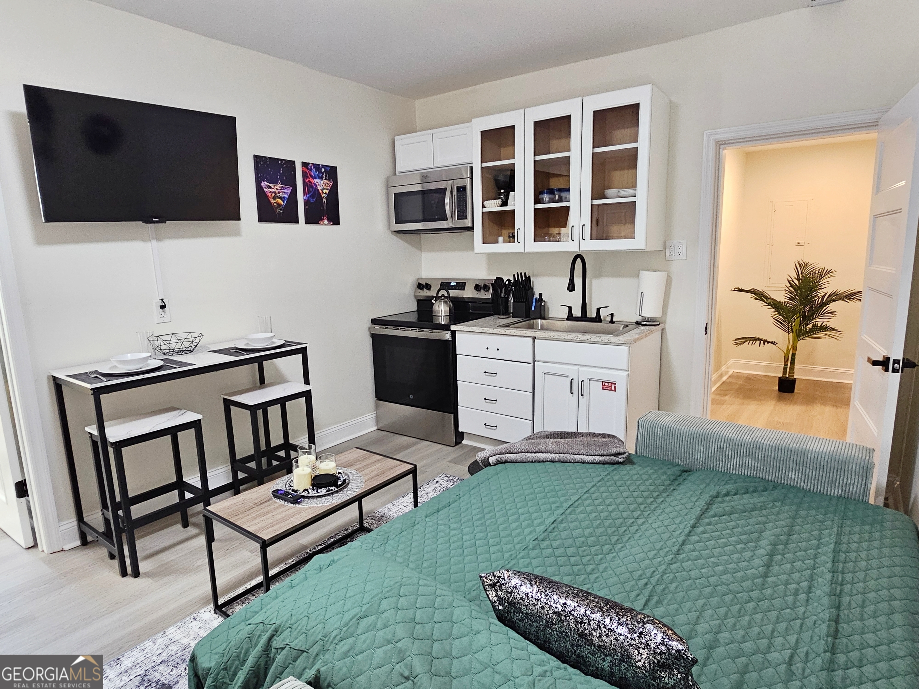 2139 Cedarbrook Court Southeast Atlanta, GA 30316 - Photo 54 of 69 a living room with furniture and a flat screen tv