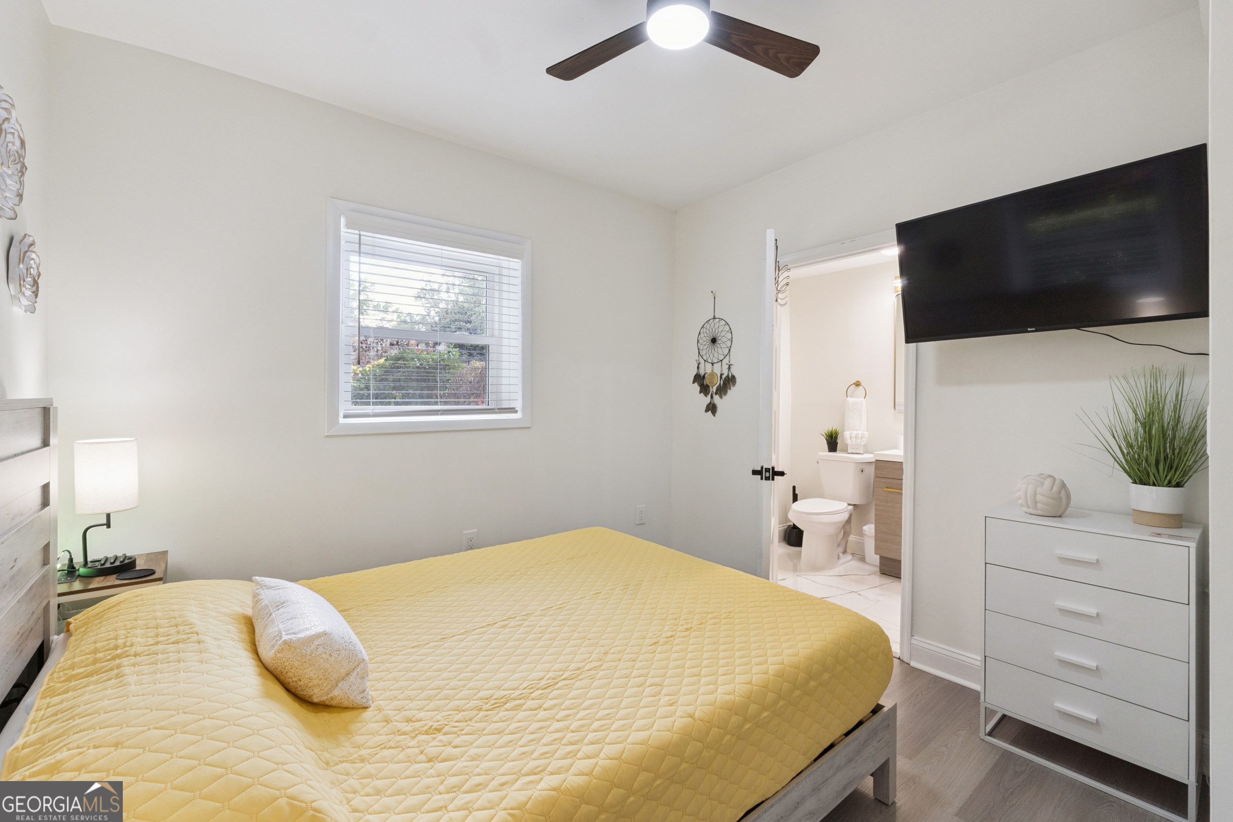 2139 Cedarbrook Court Southeast Atlanta, GA 30316 - Photo 55 of 69 a bedroom with a bed and a flat screen tv