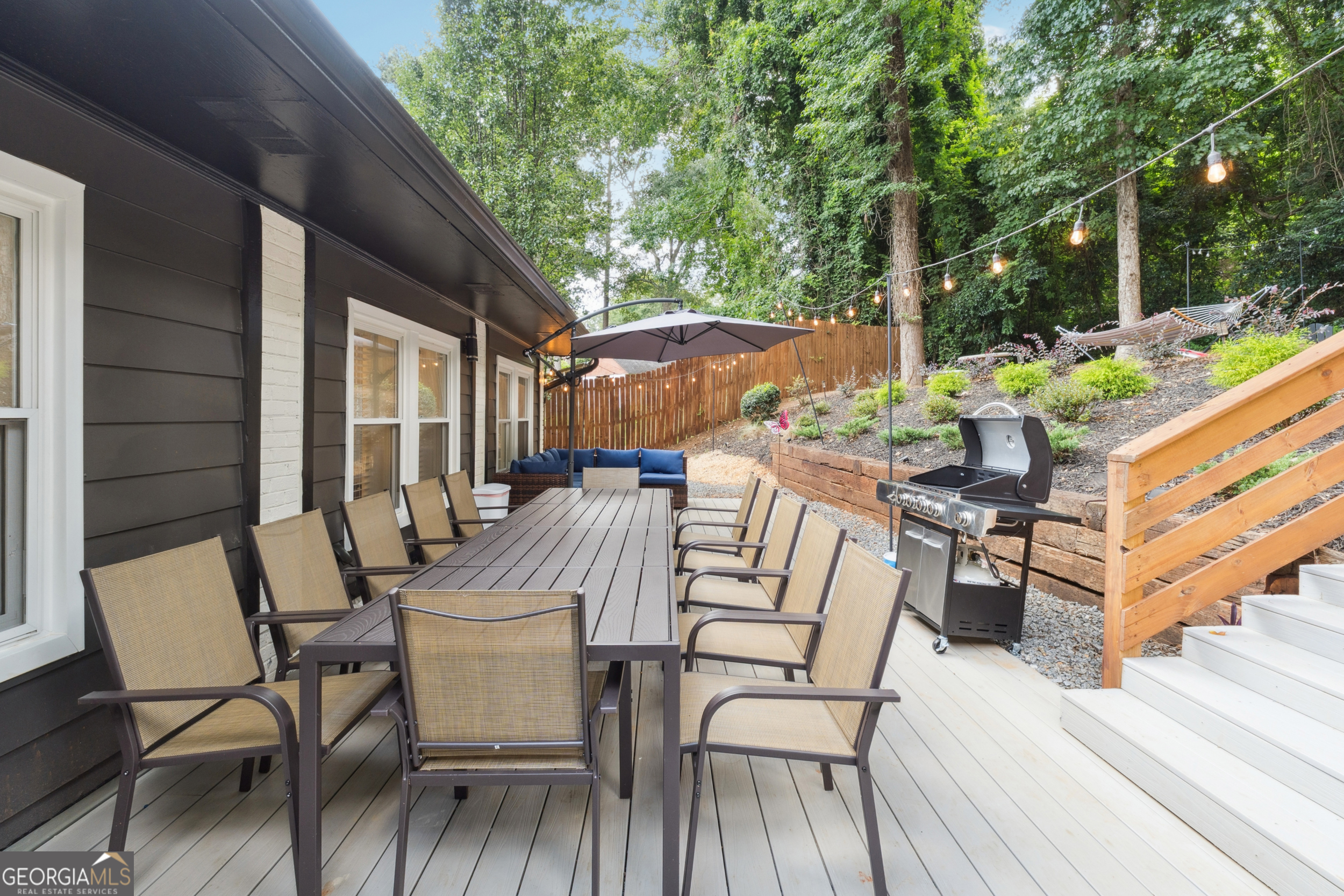 2139 Cedarbrook Court Southeast Atlanta, GA 30316 - Photo 60 of 69 a view of a patio with two chairs and a table