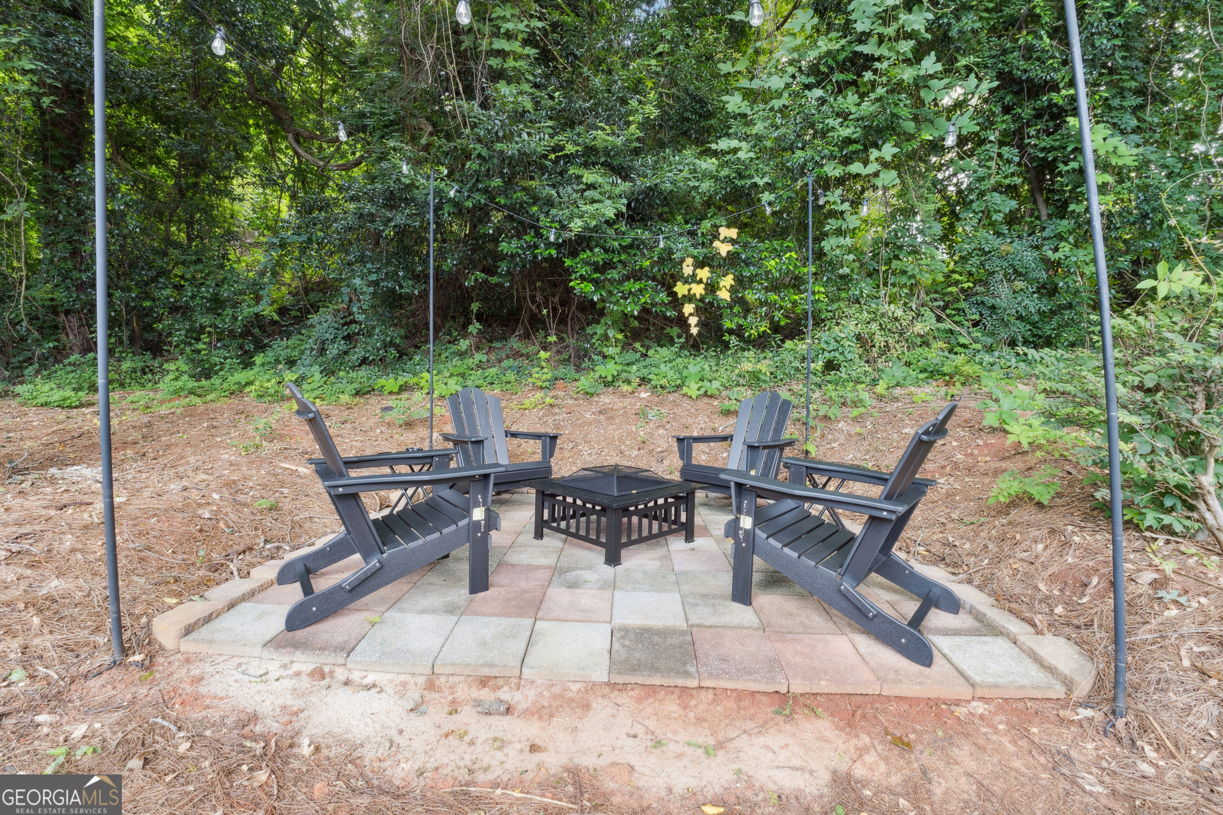 2139 Cedarbrook Court Southeast Atlanta, GA 30316 - Photo 63 of 69 a view of a patio with a table chairs and a backyard