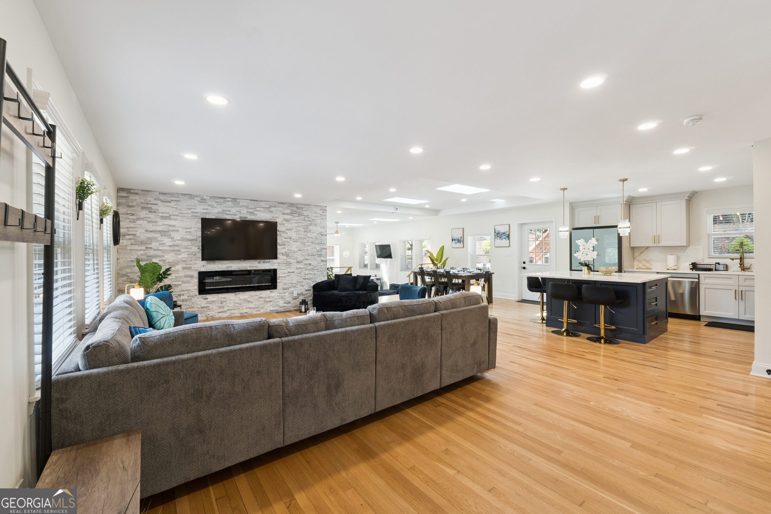 2139 Cedarbrook Court Southeast Atlanta, GA 30316 - Photo 7 of 69 a living room with furniture and a flat screen tv