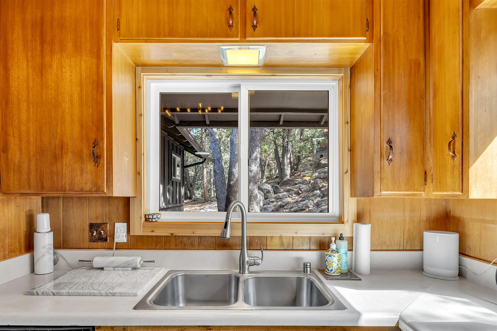 52300 Sylvan Way Idyllwild, CA 92549 - Photo 28 of 88 a kitchen with a sink and a window