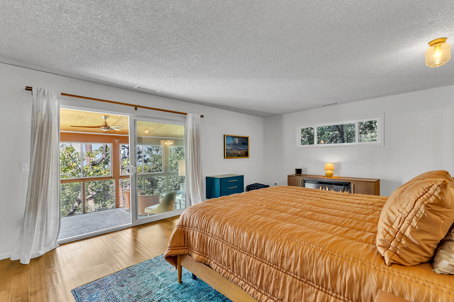 52300 Sylvan Way Idyllwild, CA 92549 - Photo 32 of 88 a bed sitting in a bedroom next to a window