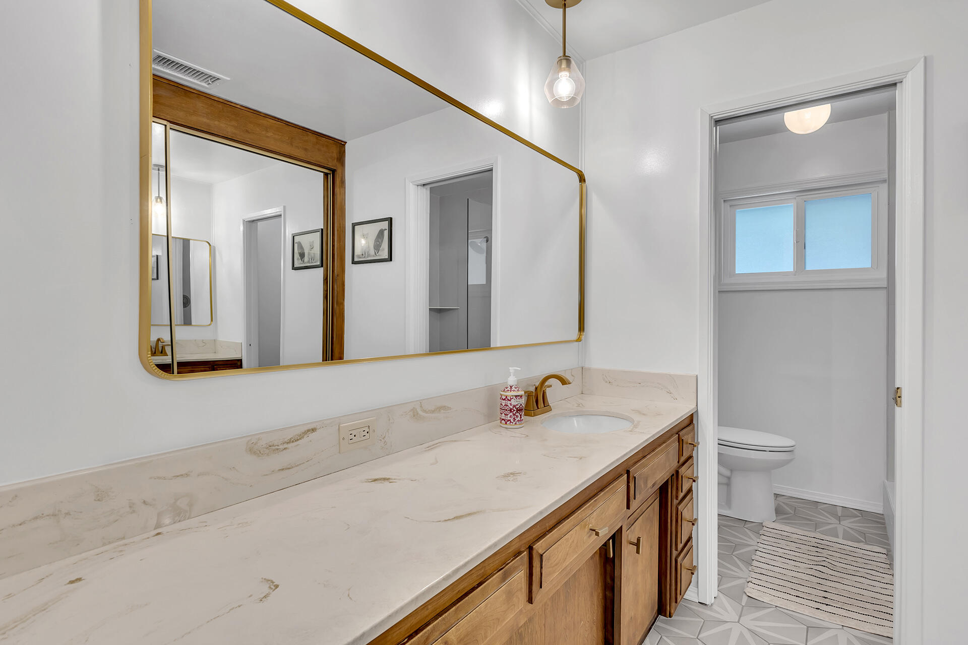52300 Sylvan Way Idyllwild, CA 92549 - Photo 37 of 88 a bathroom with a sink a toilet and a mirror