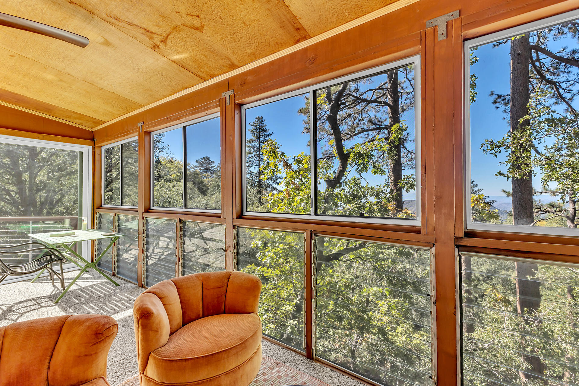 52300 Sylvan Way Idyllwild, CA 92549 - Photo 43 of 88 a blue chair sitting in front of a building