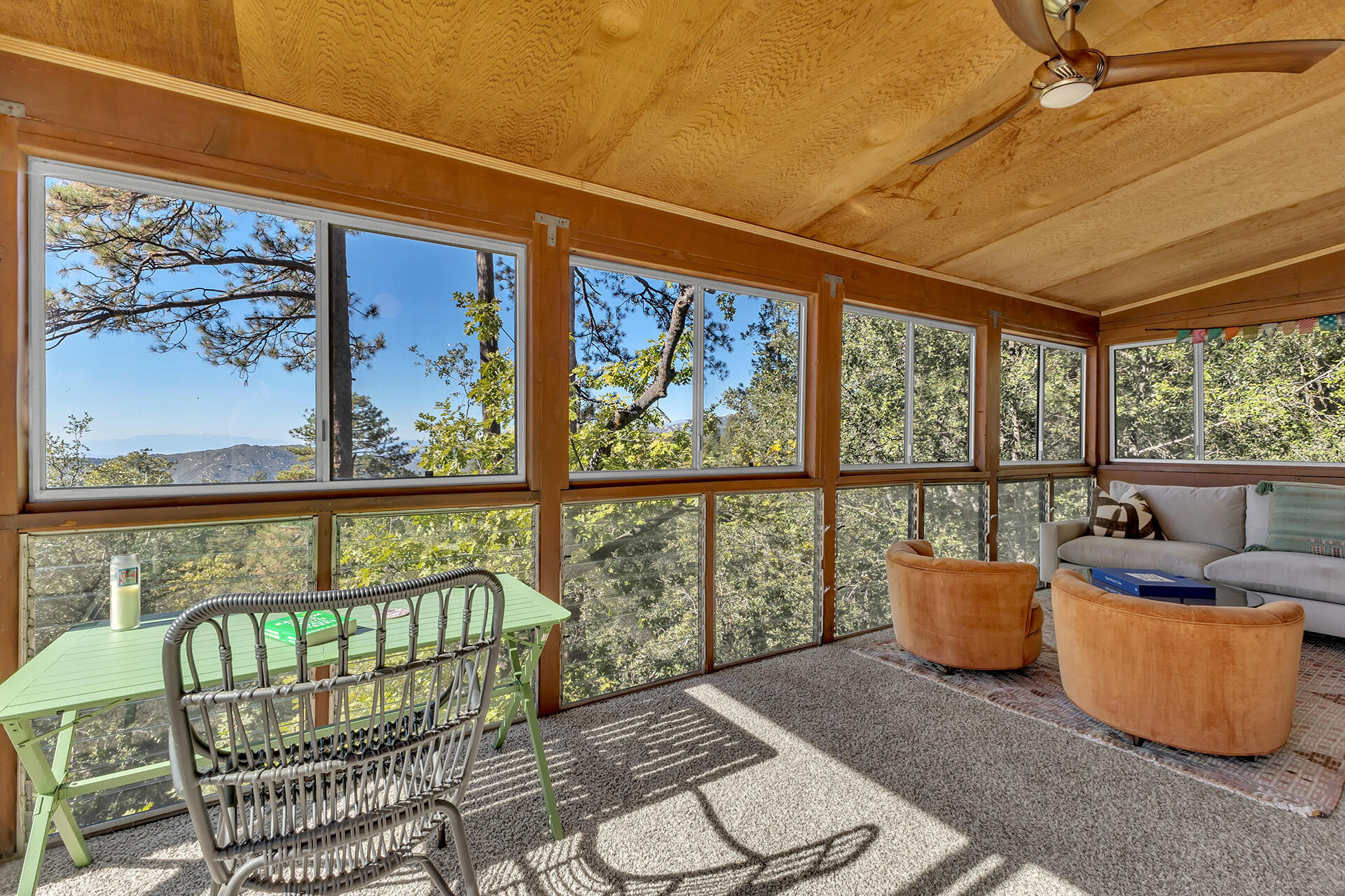 52300 Sylvan Way Idyllwild, CA 92549 - Photo 44 of 88 a living room with furniture and a floor to ceiling window