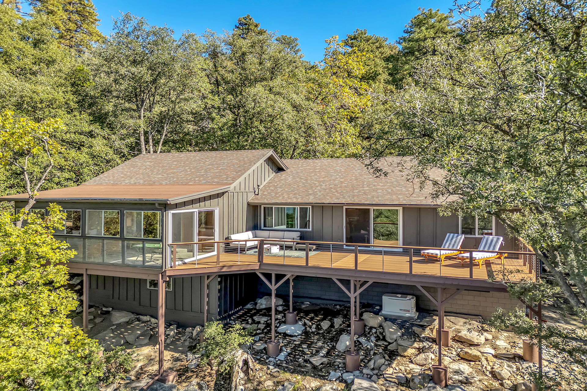 52300 Sylvan Way Idyllwild, CA 92549 - Photo 58 of 88 a backyard of a house with barbeque oven and outdoor seating
