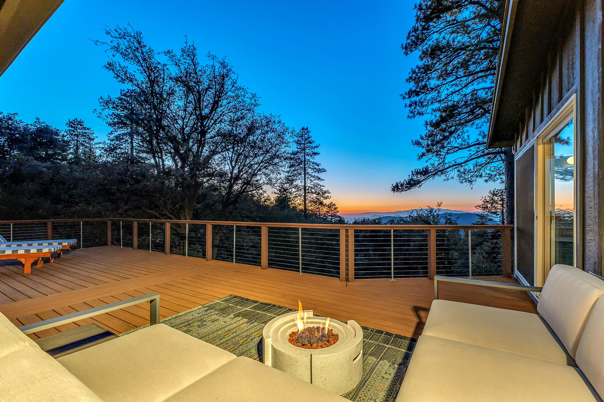 52300 Sylvan Way Idyllwild, CA 92549 - Photo 72 of 88 a view of a balcony with a floor to ceiling window next to a yard