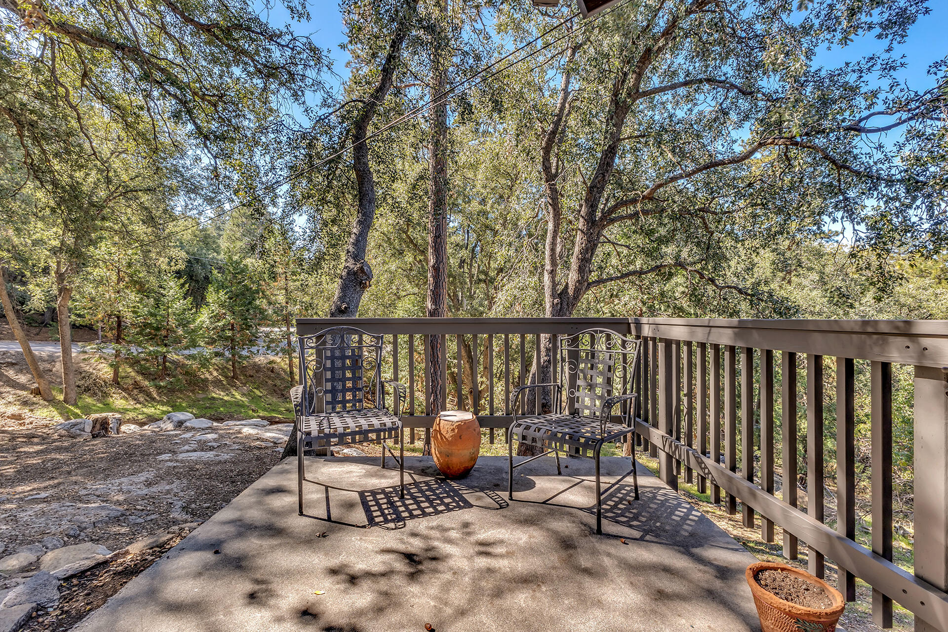 52300 Sylvan Way Idyllwild, CA 92549 - Photo 85 of 88 a view of a chairs and table in the back yard of the house