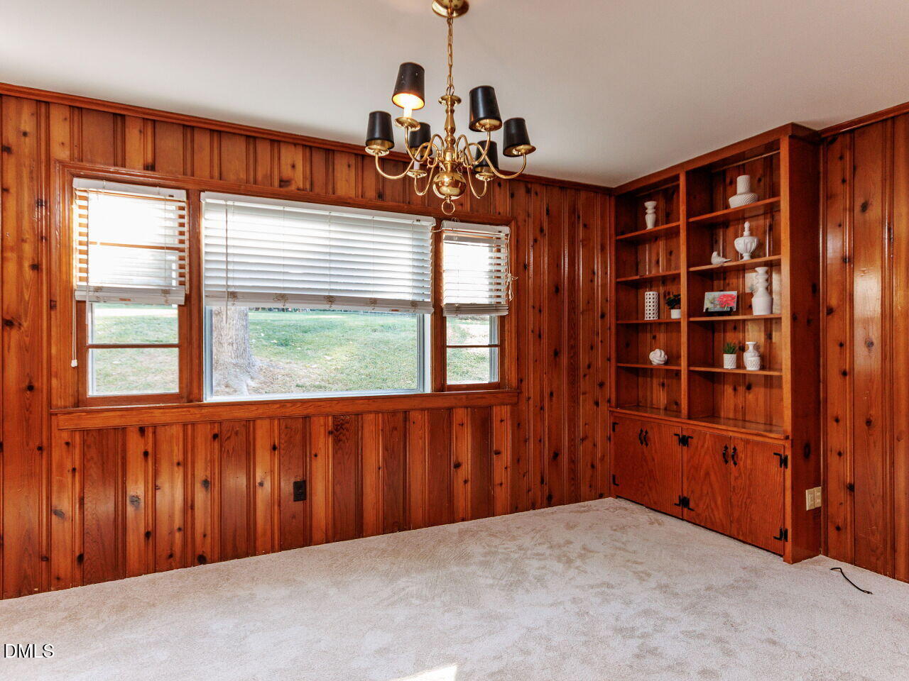 1332 Banbury Road Raleigh, NC 27607 - Photo 16 of 46 a view of an empty room with a window