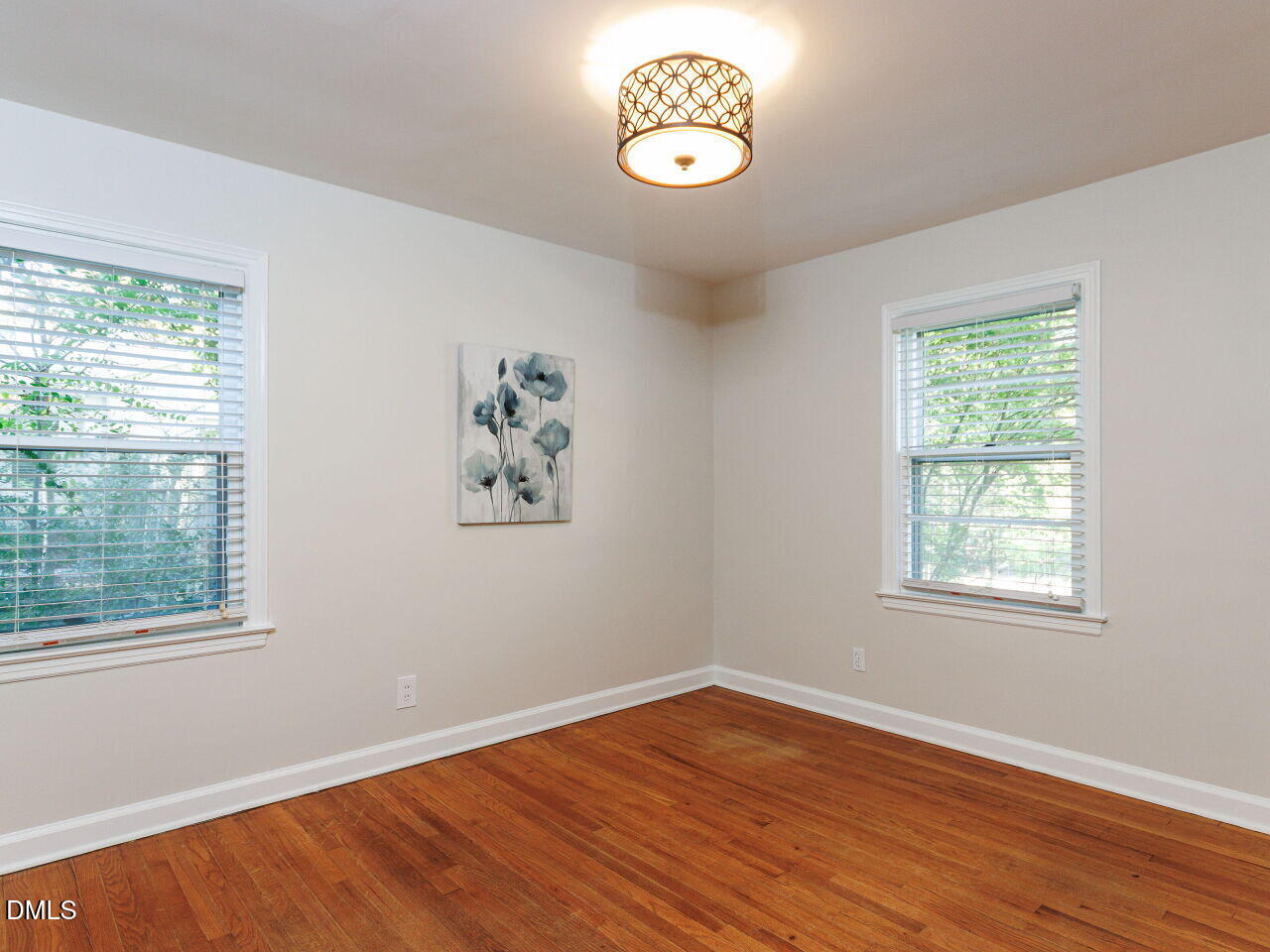 1332 Banbury Road Raleigh, NC 27607 - Photo 24 of 46 an empty room with a window