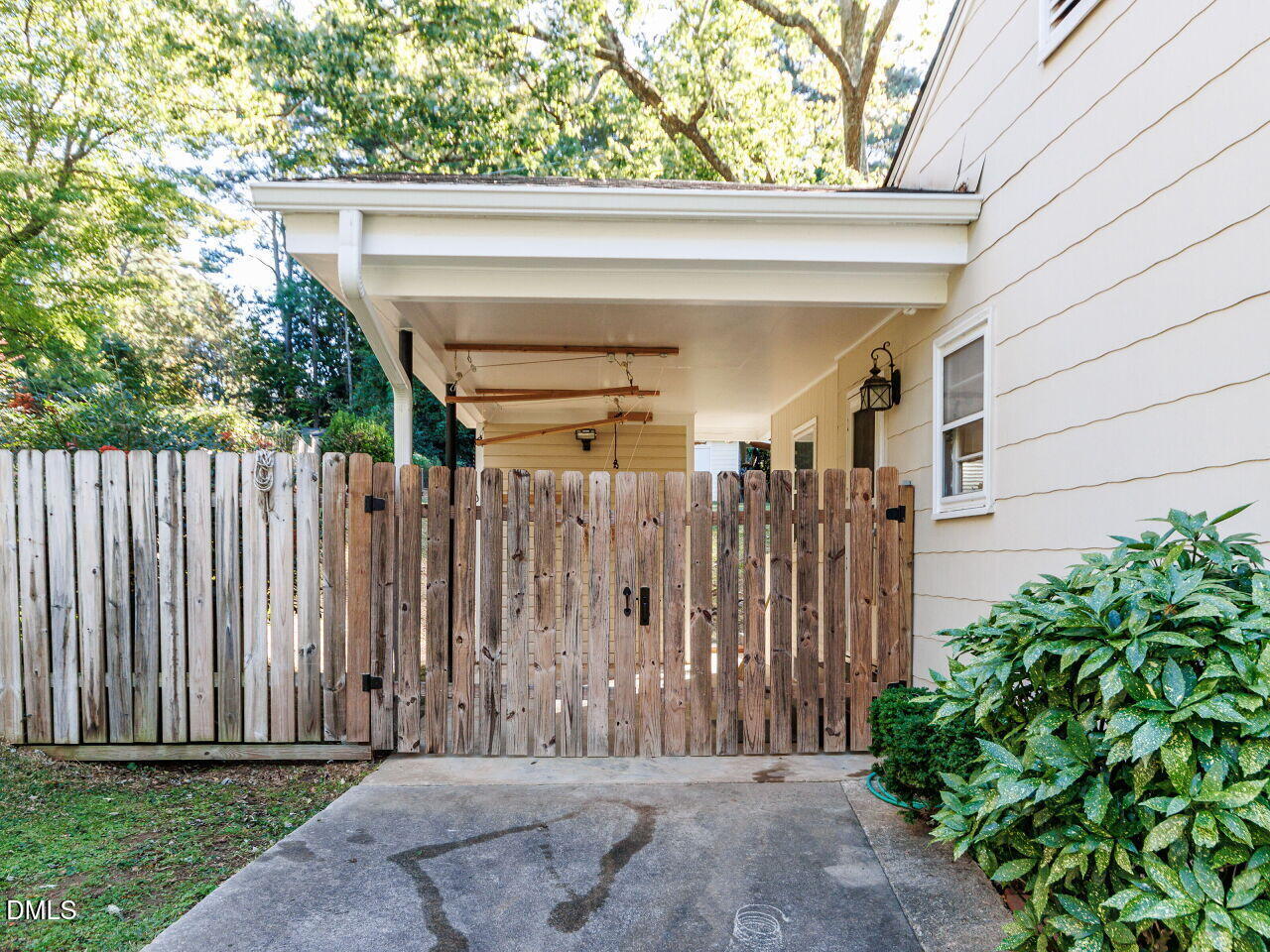 1332 Banbury Road Raleigh, NC 27607 - Photo 41 of 46 a view of a house with a wooden fence