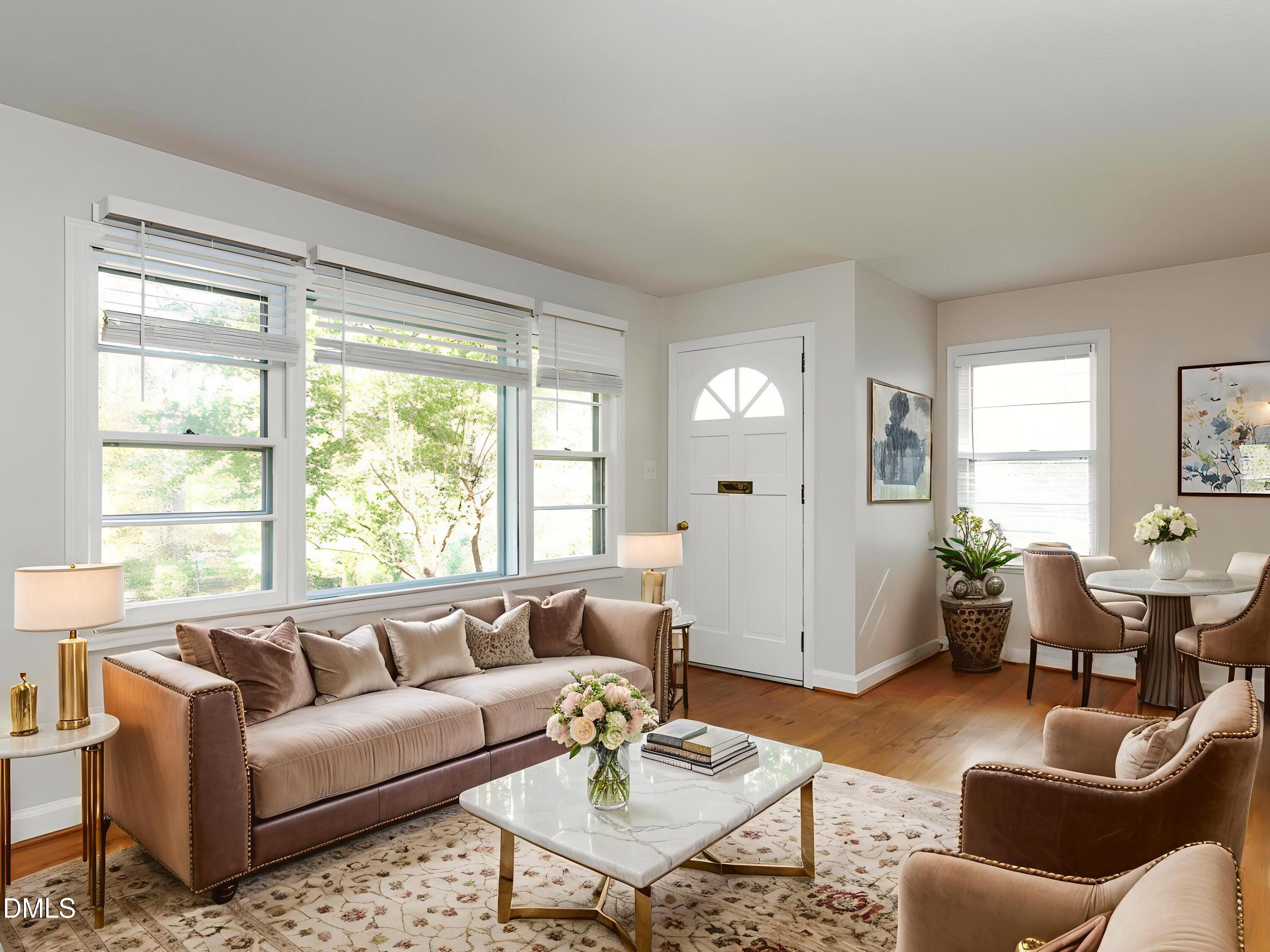 1332 Banbury Road Raleigh, NC 27607 - Photo 8 of 46 a living room with furniture and a large window