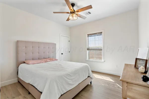 a bathroom with 2 sink and a mirror
