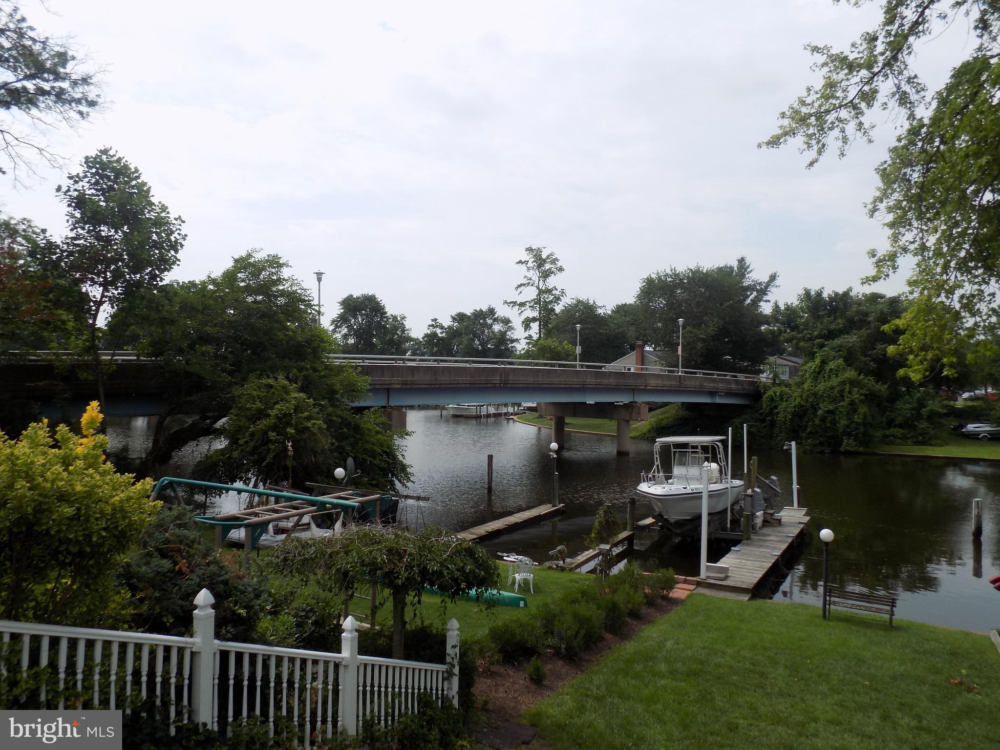 702 Towne Center Drive Joppa, MD 21085 - Photo 27 of 45 a view of a chair and table in the garden