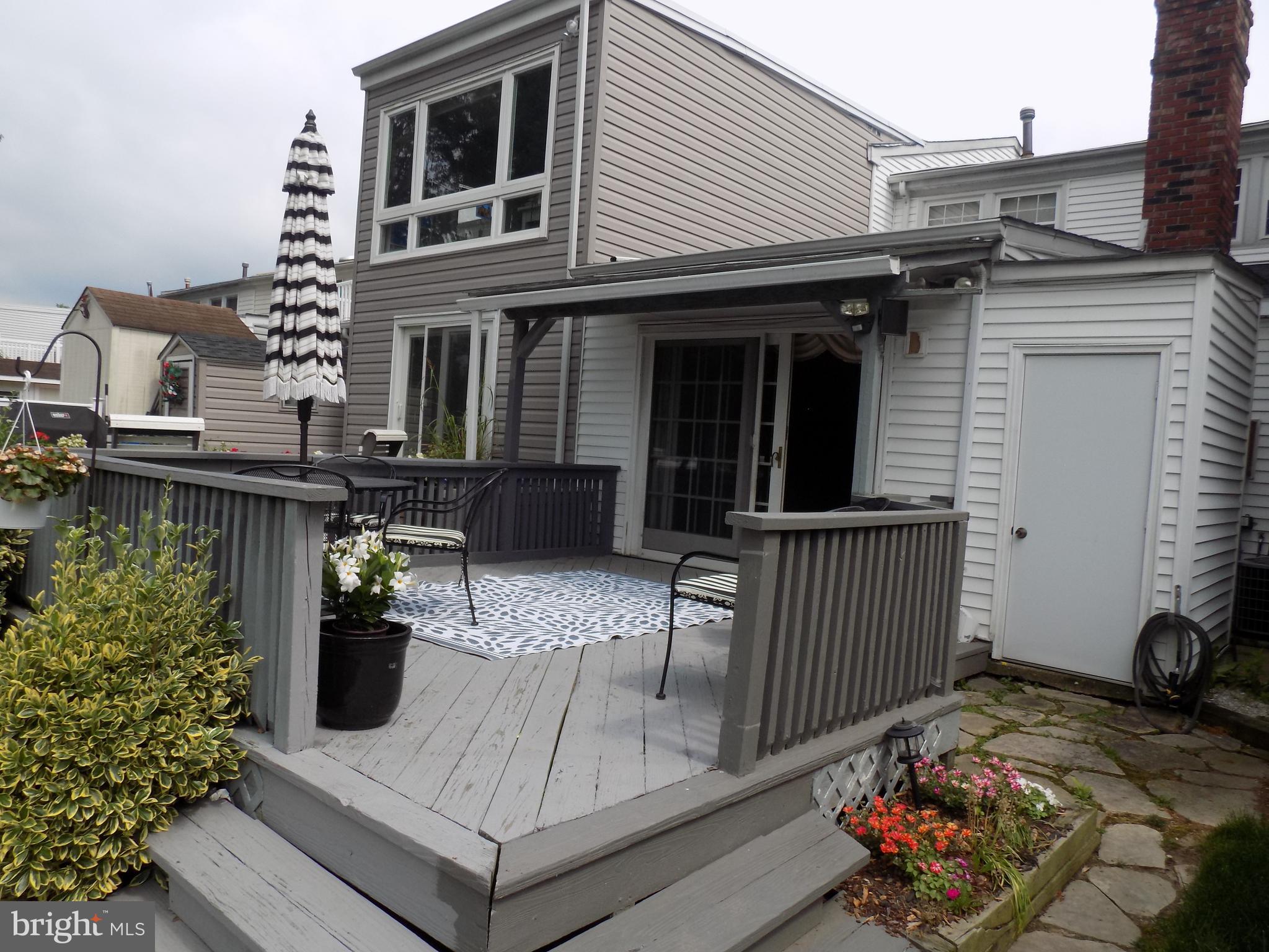 702 Towne Center Drive Joppa, MD 21085 - Photo 31 of 45 front view of a house with a chair