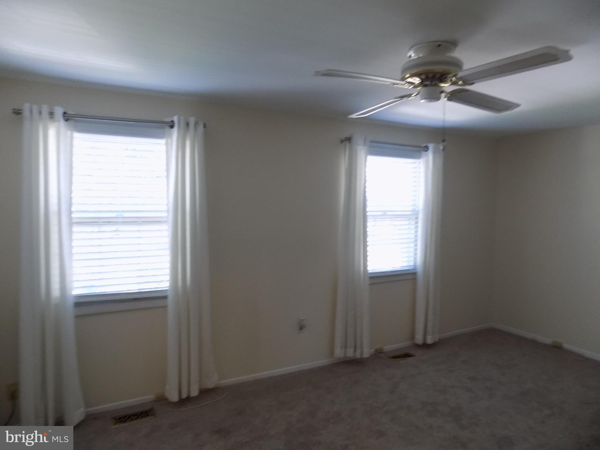 702 Towne Center Drive Joppa, MD 21085 - Photo 35 of 45 a view of an empty room with a window