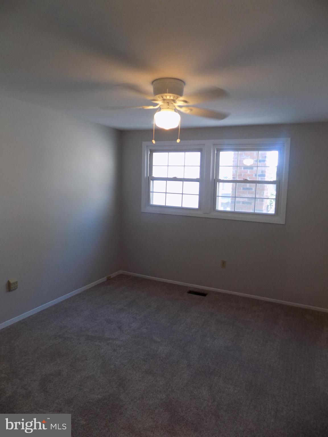 702 Towne Center Drive Joppa, MD 21085 - Photo 41 of 45 an empty room with a window