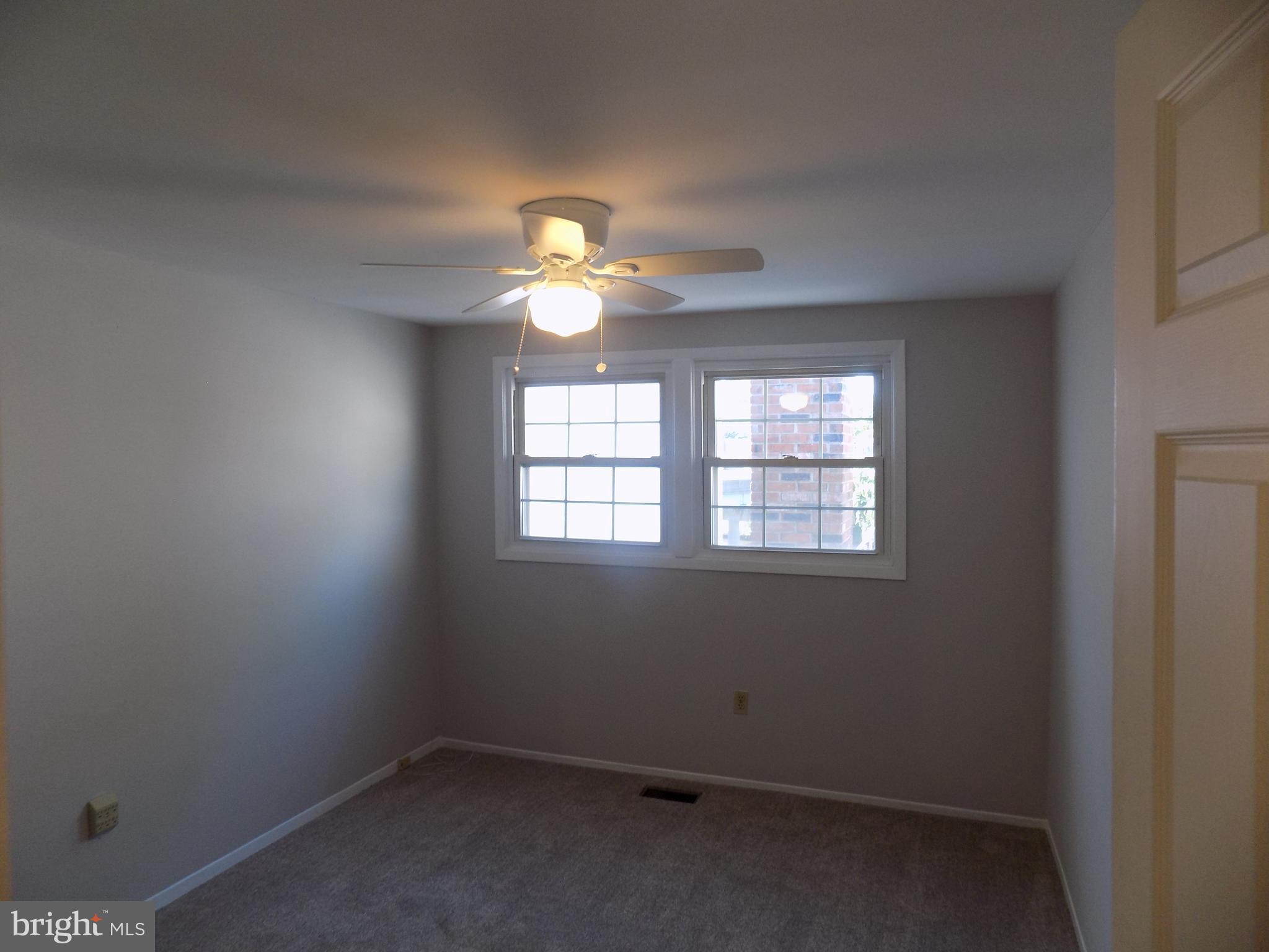 702 Towne Center Drive Joppa, MD 21085 - Photo 42 of 45 an empty room with a window