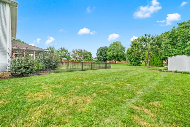 an aerial view of a house with a garden