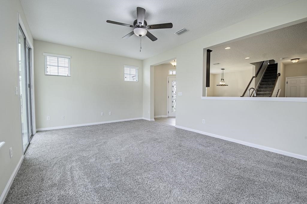 41 Nelson Lane St. Johns, FL 32259 - Photo 12 of 34 a view of a livingroom with a ceiling fan and window