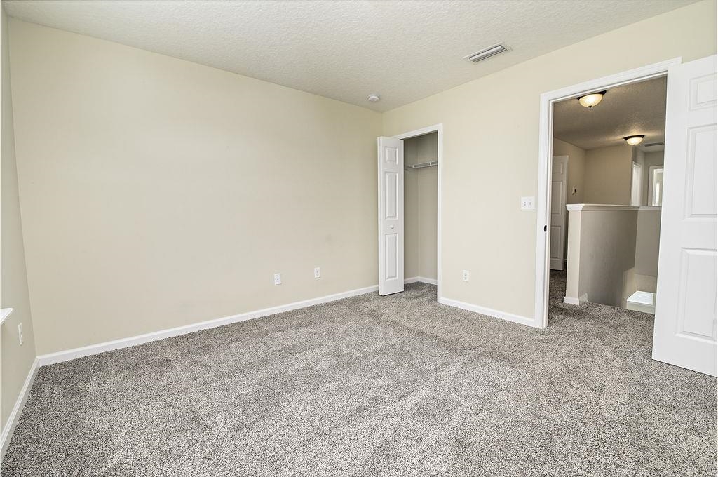 41 Nelson Lane St. Johns, FL 32259 - Photo 19 of 34 an empty room with closet and a bathroom