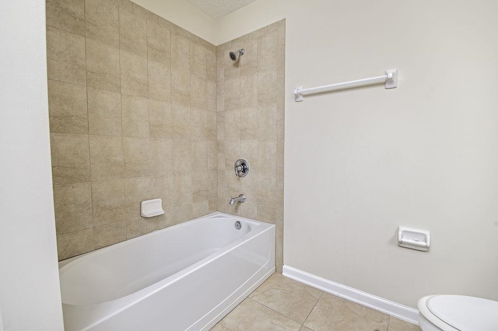 41 Nelson Lane St. Johns, FL 32259 - Photo 21 of 34 a bathroom with a bathtub and a shower