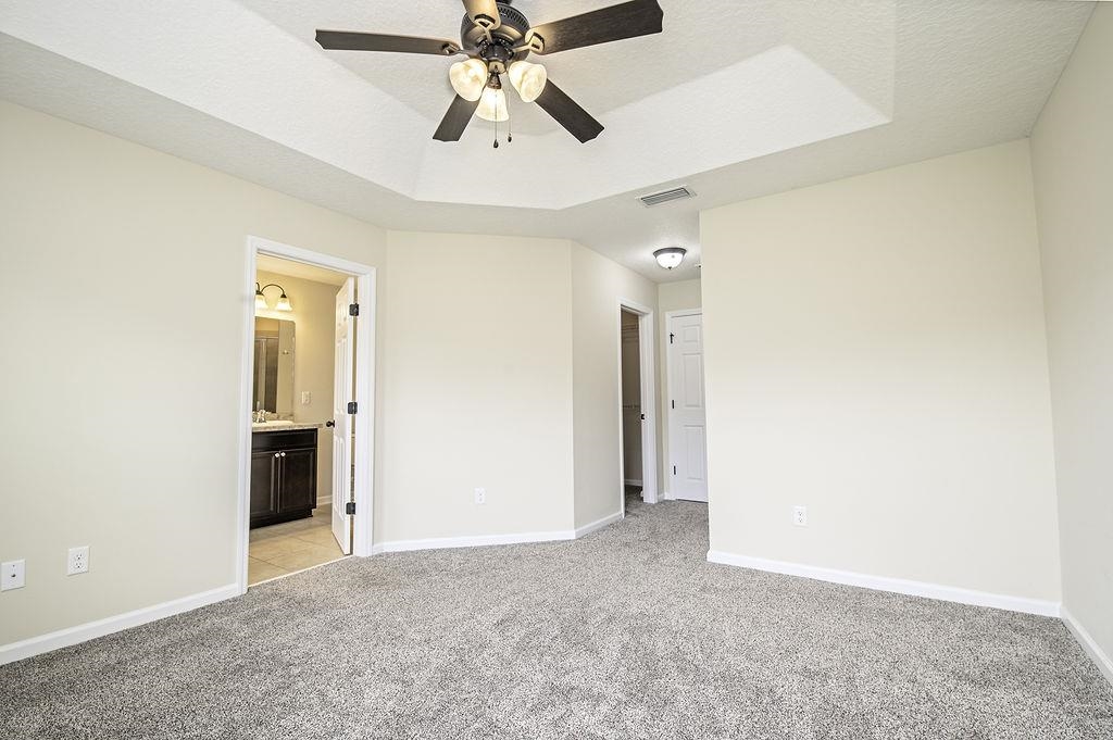 41 Nelson Lane St. Johns, FL 32259 - Photo 24 of 34 an empty room with closet and a ceiling fan